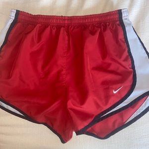 Red Nike women’s running shorts size S